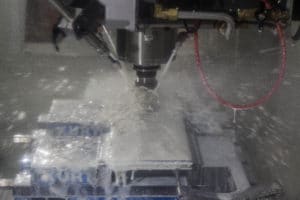 CNC Mill running second operation on aluminum base plate